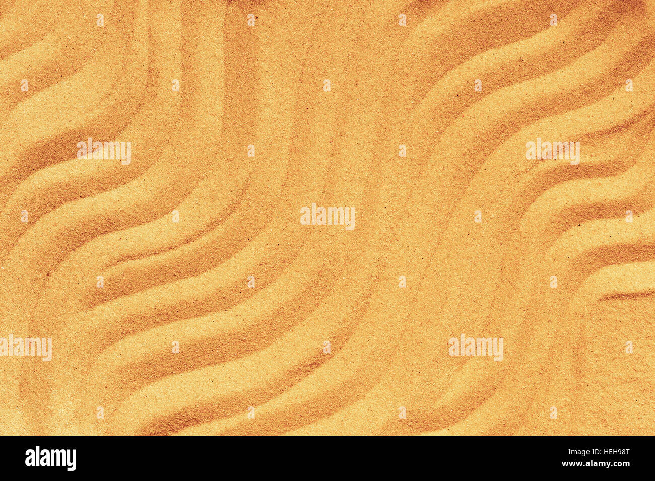 Pattern on the yellow sand, yellow wavy lines Stock Photo