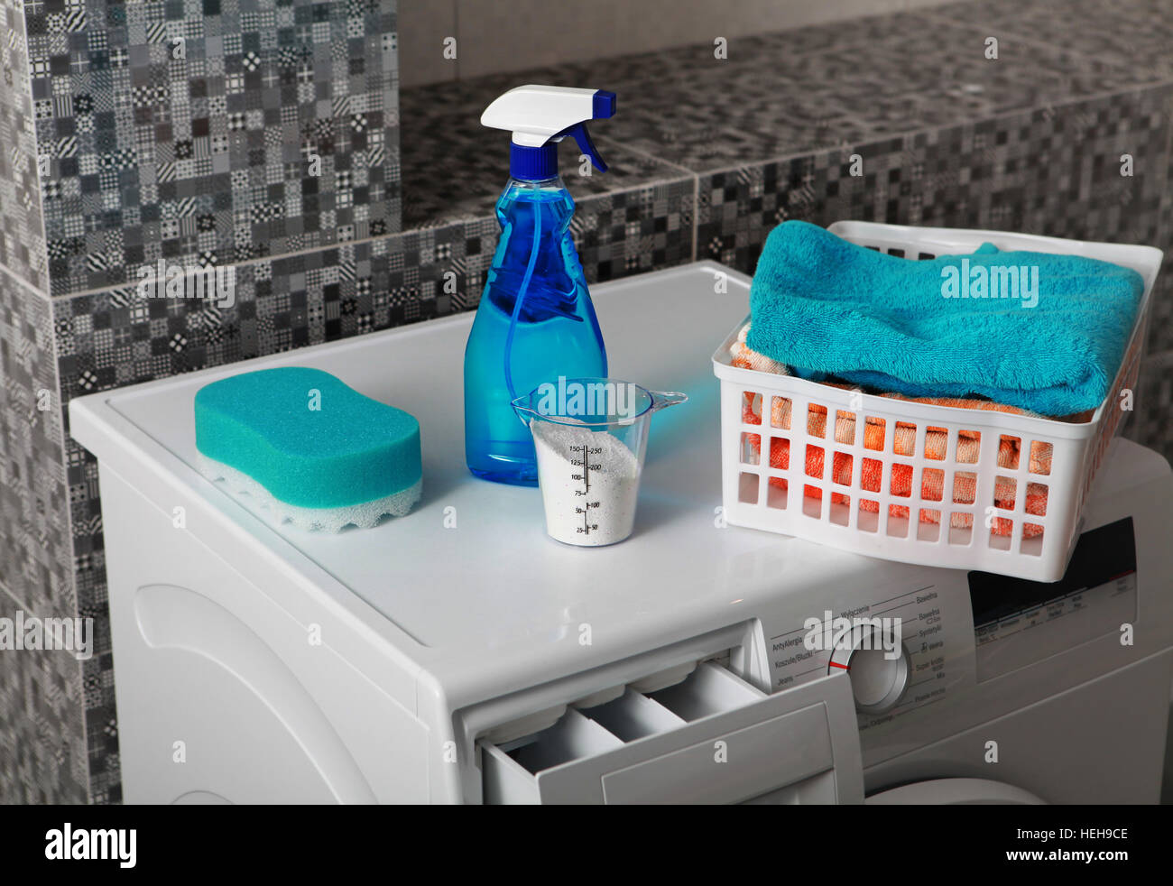 part of washing machine and laundry powder for washing Stock Photo Alamy