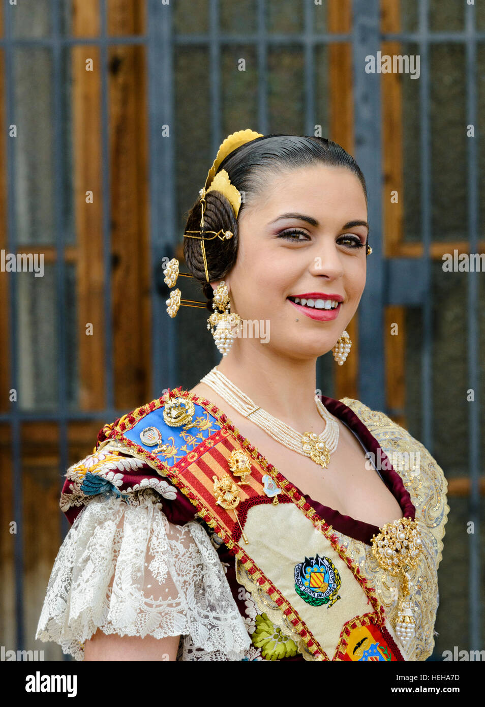 Las Fallas Spanish girl wearing Fallera traditional costume in Valencia Spain. Stock Photo