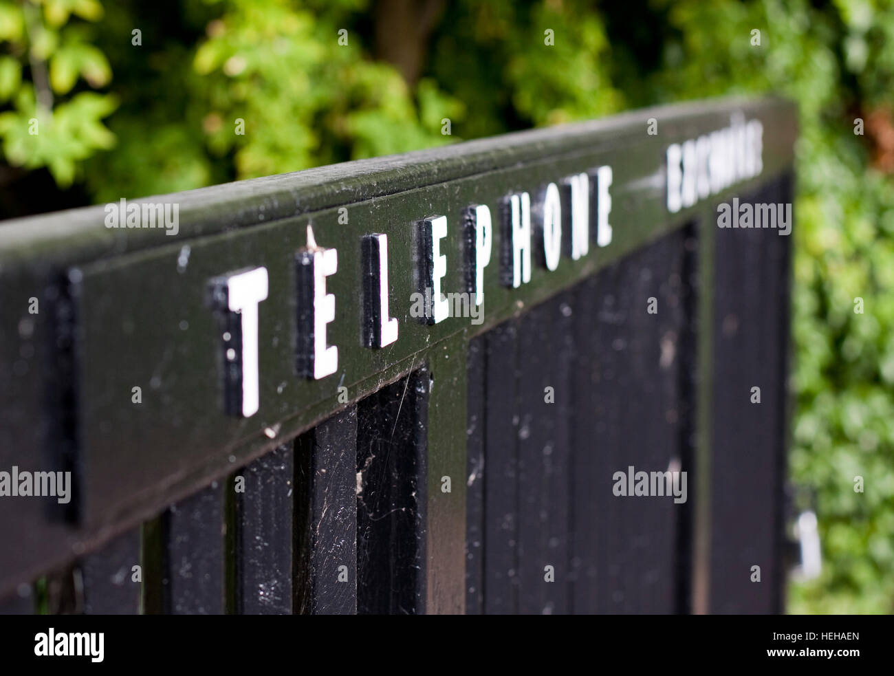 Raised letters spelling Telephone Exchange on an entrance gate Stock