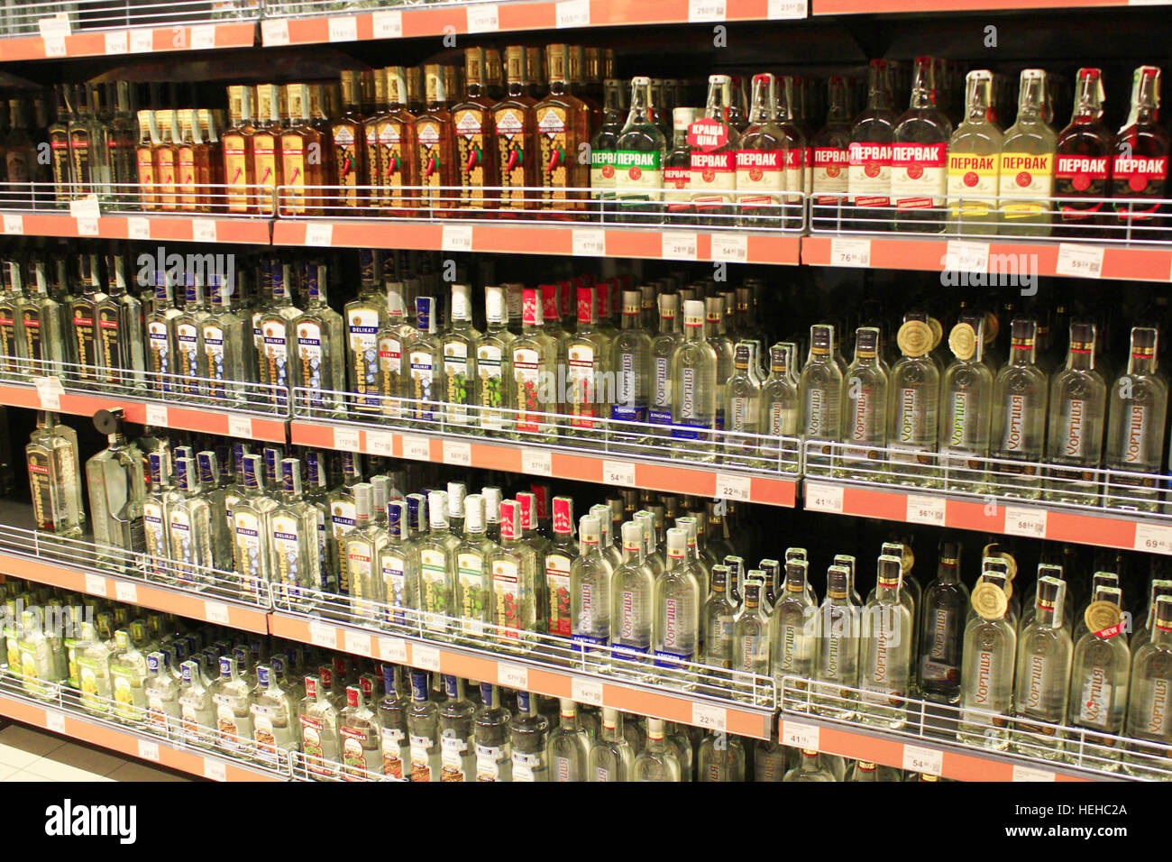 Alcoholic drinks on shelves supermarket hi-res stock photography and