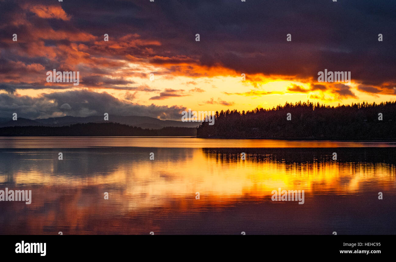 Dramatic Sunset on the Puget Sound over Hope Island State Park, Washington, USA Stock Photo