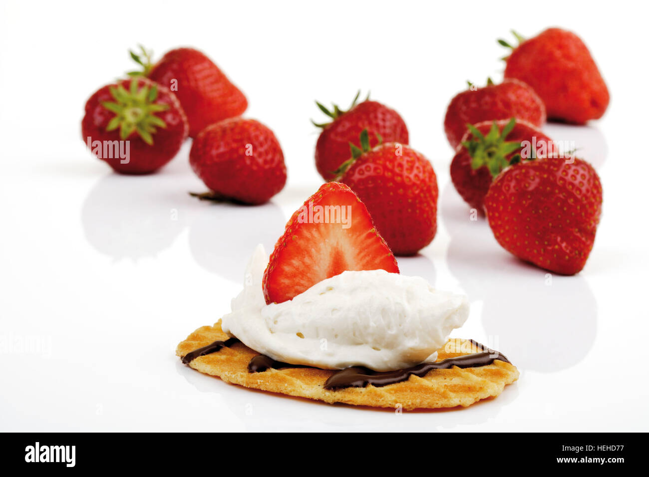 Waffle topped with whipped cream and a strawberry, strawberries Stock ...