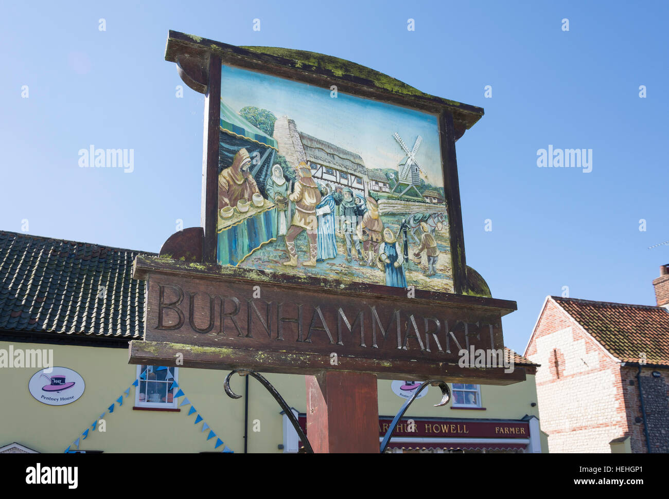 Village sign on The Green, Market Place, Burnham Market, Norfolk, England, United Kingdom Stock Photo