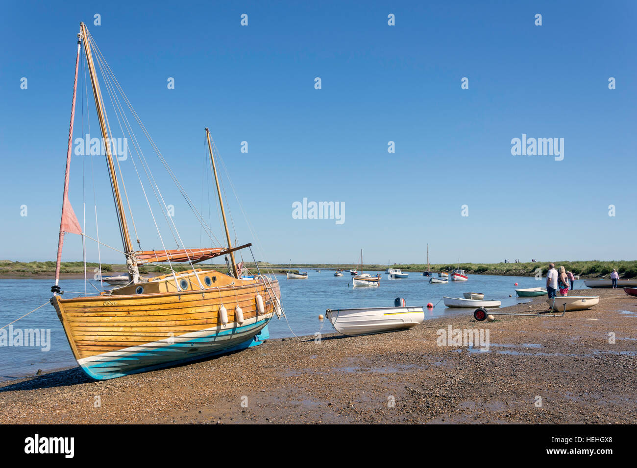 Traditional sailing boats on River Burn from The Quay, Burnham Overy Staithe, Norfolk, England, United Kingdom Stock Photo