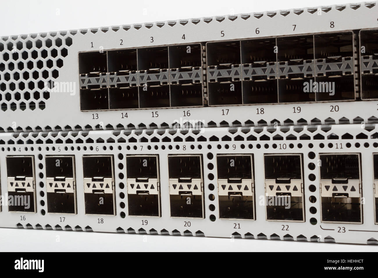 detail of fiber optic gigabit ethernet switch with SFP module slot and UTP category 5 connectors RJ-45 Stock Photo