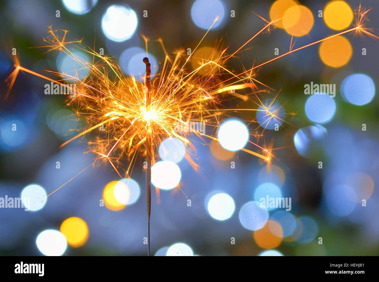 Bright festive Christmas sparkler and lights Stock Photo