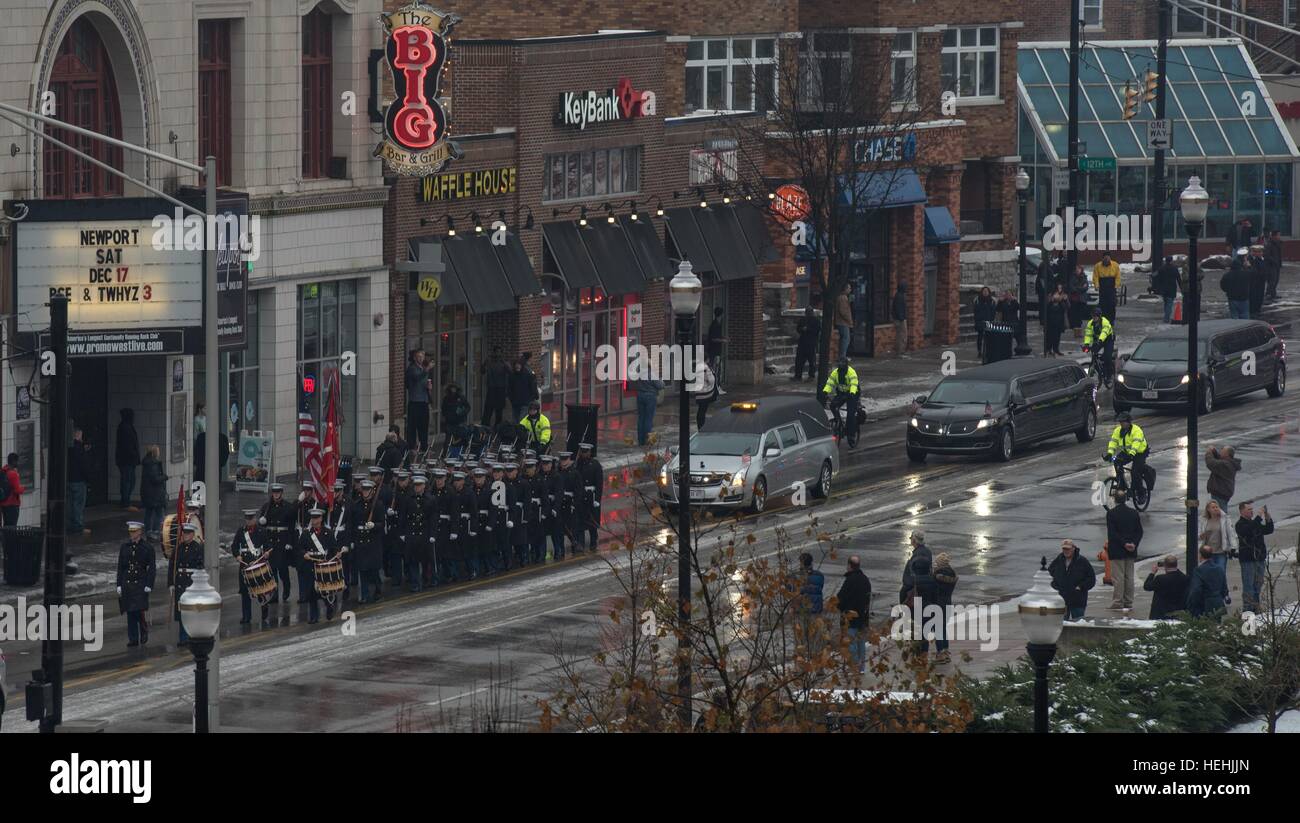 The U.S. Marine Honor Guard leads the funeral procession for former NASA astronaut and U.S. Senator John Glenn down a city street December 17, 2016 in Columbus, Ohio. Stock Photo