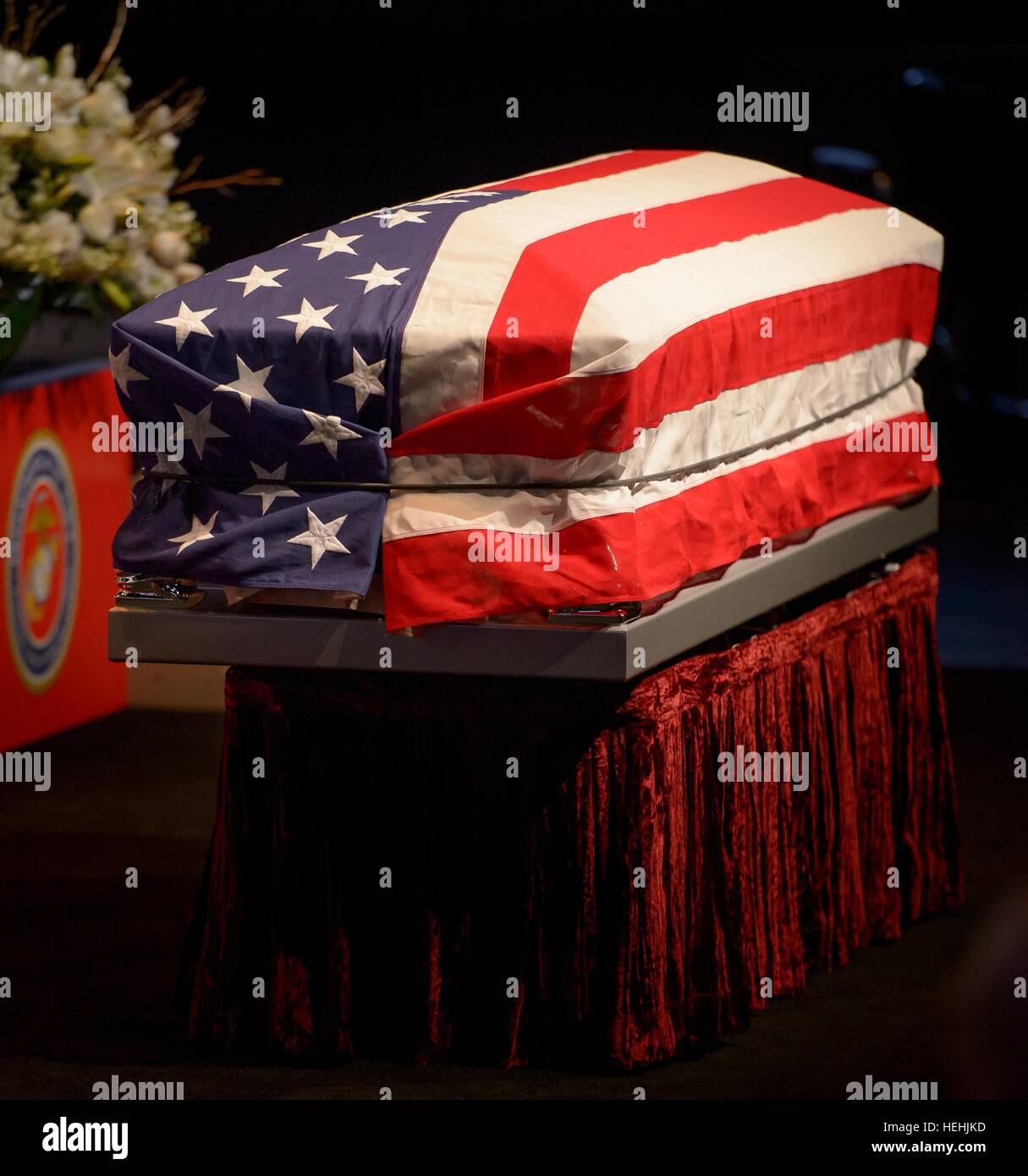 The American flag is draped over the casket of former NASA astronaut and U.S. Senator John Glenn during a memorial service celebrating his life at the Ohio State University Mershon Auditorium December 17, 2016 in Columbus, Ohio. Stock Photo