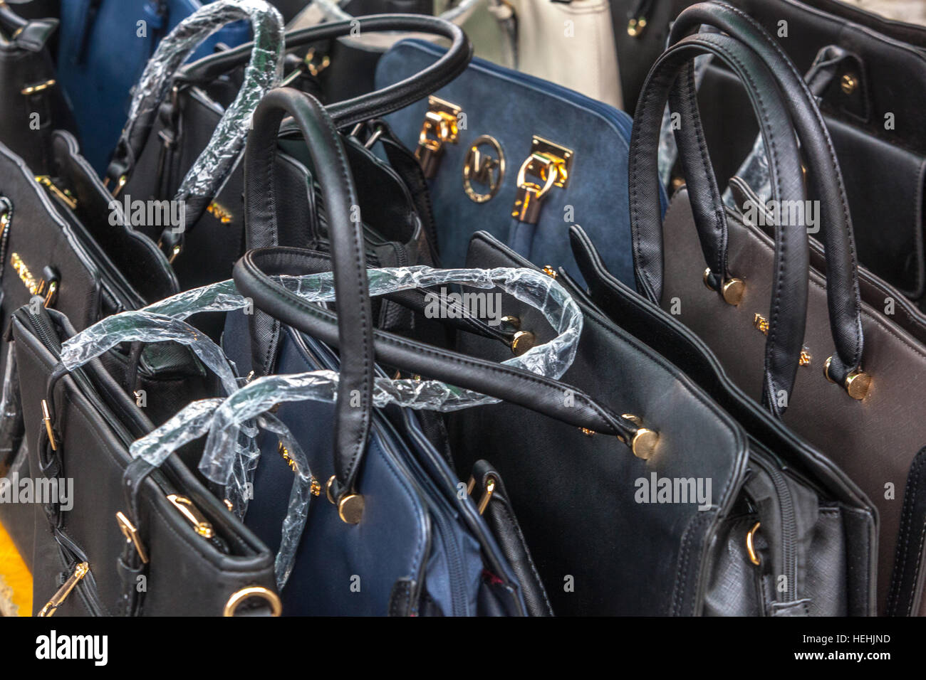 Selling fake handbags renowned brand Michael Kors, market, Holesovice, Prague, Czech Republic Stock Photo