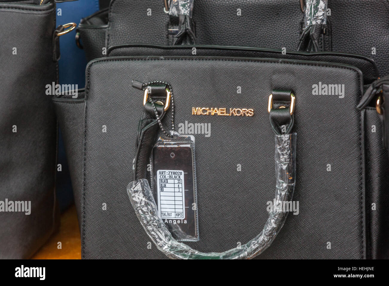 Selling fake handbags renowned brand Michael Kors, market, Holesovice, Prague, Czech Republic Stock Photo
