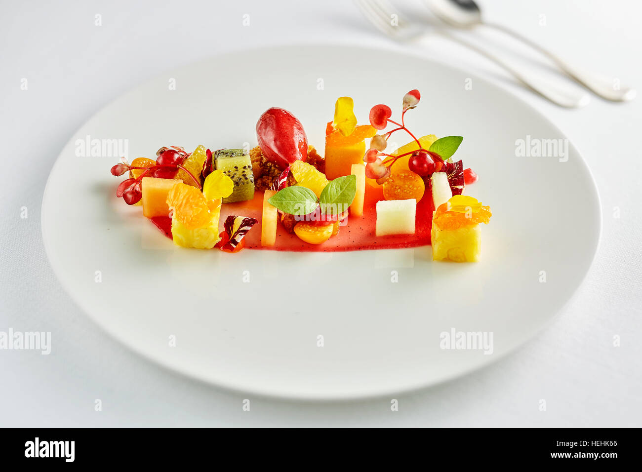 amazing fruit salad creative beautiful prepared pineapple pear kiwi orange strawberry berry Stock Photo
