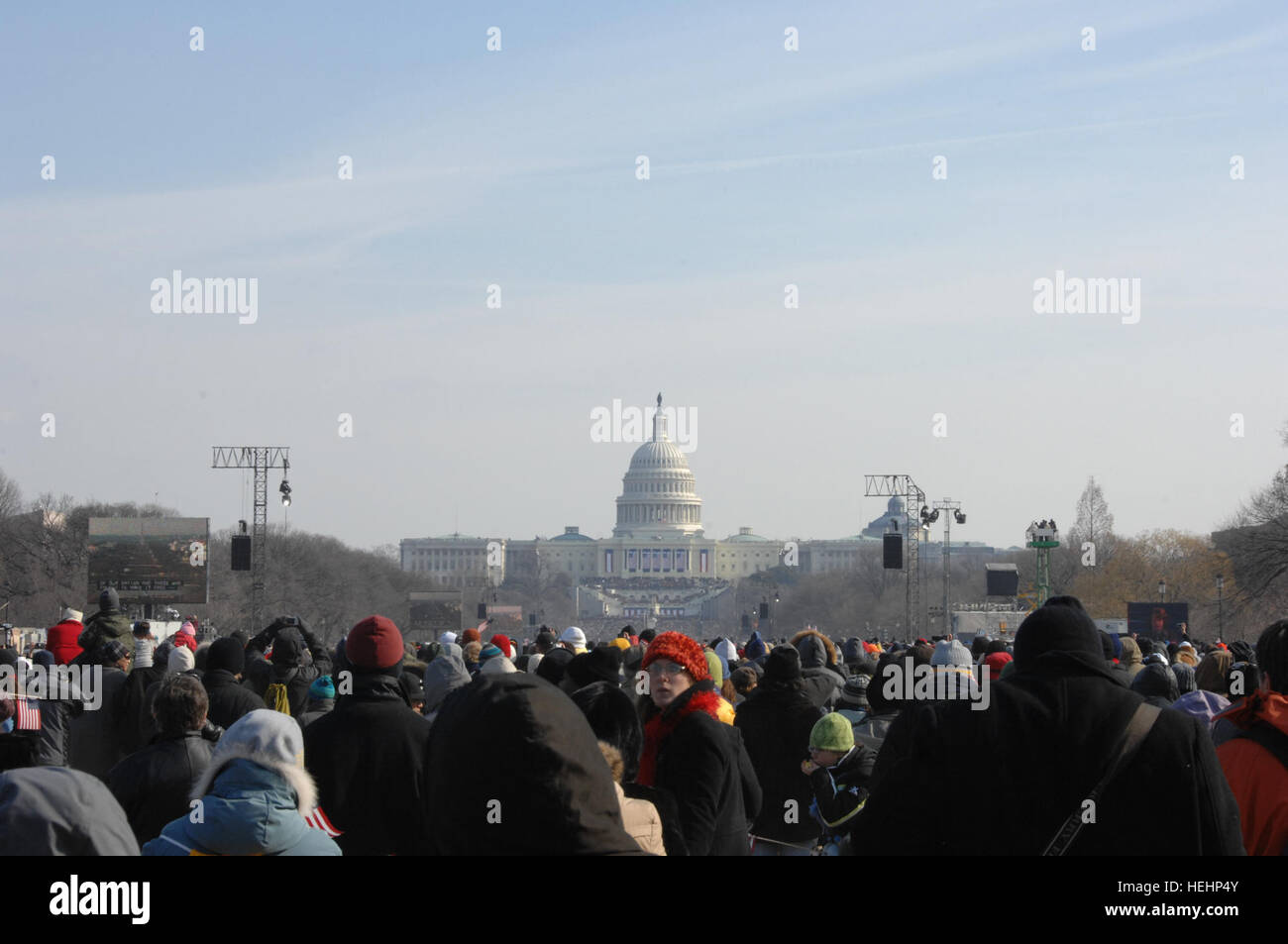 Thousands of people celebrate the moment when President Barack Obama is sworn in as the 44th President of the United States at the Capitol building in Washington, D.C., during Obama's inauguration ceremony Jan. 20, 2009. (U.S. Army photo by Sgt. Teddy Wade/Released) President Barack Obama inauguration ceremony 090120-A-AO884-258 Stock Photo