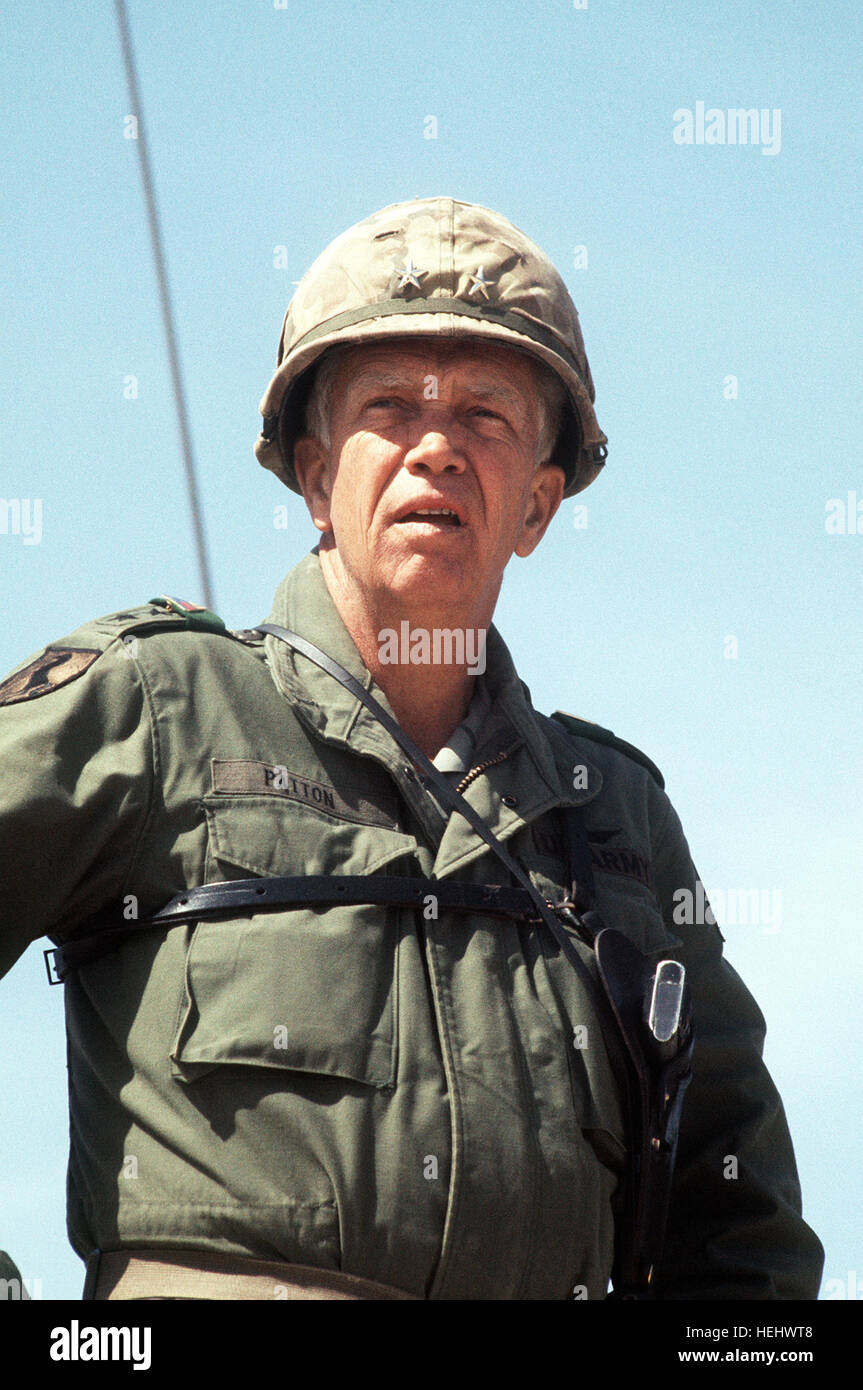 MGEN Georg S. Patton Jr., commander of the 2nd Armored Division, watches the Cowhouse River crossing during the joint services Operation Gallant Crew '77. George Patton IV DF-ST-84-01686 Stock Photo