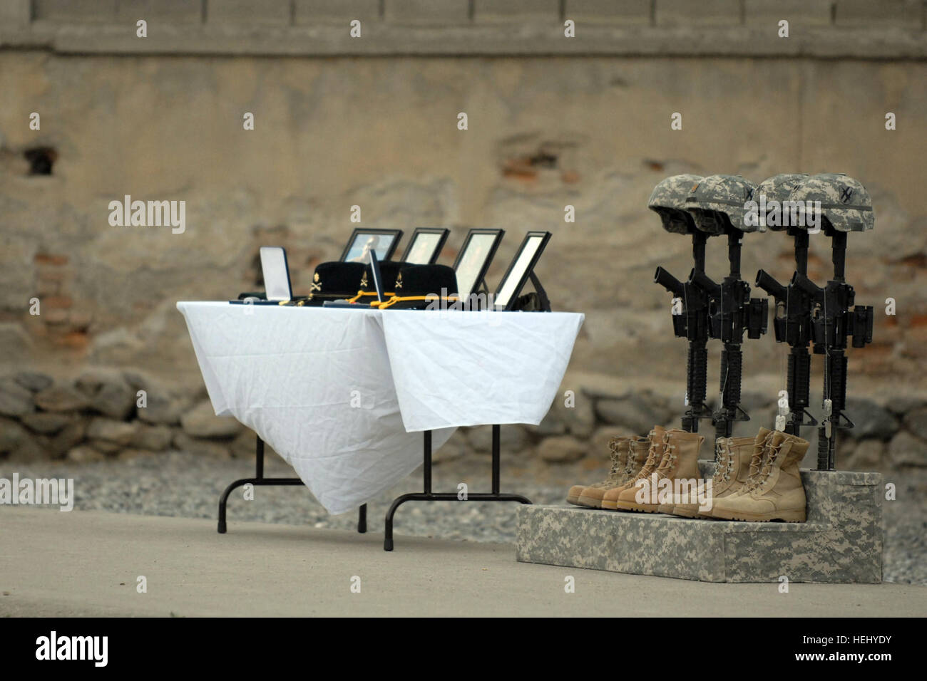 Field crosses and a memorial display stand as a reminder at Camp Phoenix in Kabul, Afghanistan, of the sacrifice the following Soldiers made for their country, Maj. Kevin M. Jenrette, 37, of Lula, Ga., Sgt. 1st Class John C. Beale, 39, of Riverdale, Ga., and Spc. Jeffrey W. Jordan, 21, of Rome, Ga., three members of the 1st Battalion, 108th Reconnaissance, Surveillance and Target Acquisition Squadron, 48th Infantry Brigade Combat Team, Georgia Army National Guard, Calhoun, Ga., and Maj. Rocco M. Barnes of the California Army National Guard. Guard members honor fallen comrades 179141 Stock Photo