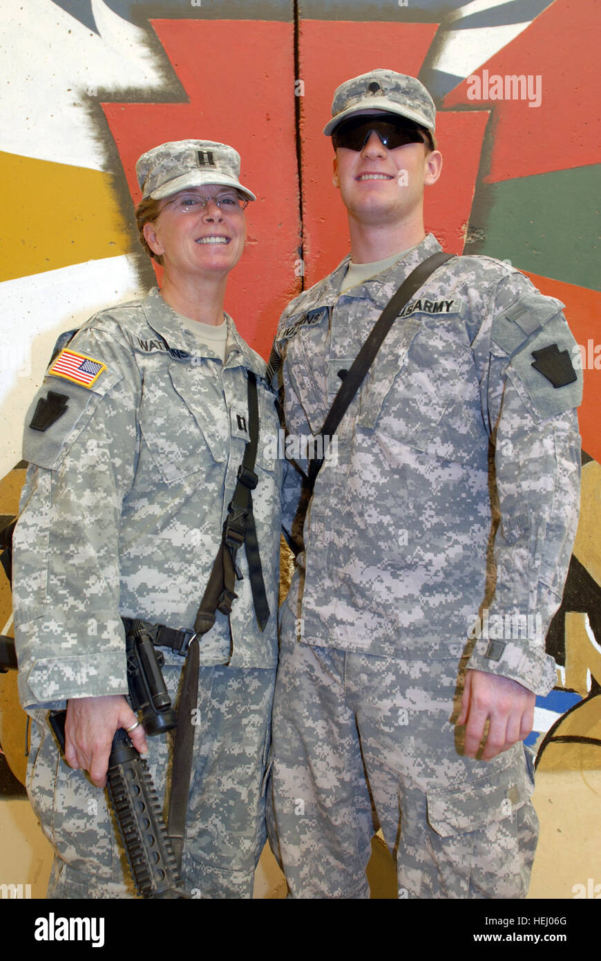 Capt. Dorothy Watkins and Spc. Joshua Watkins, both of Hazleton, Pa., are deployed to Camp Taji, a base camp north of Baghdad, with the 56th Stryker Brigade Combat Team, 28th Infantry Division, Pennsylvania National Guard. Capt. Watkins volunteered for the deployment so she could be with her son. Spc. Watkins is a cavalry scout assigned to A Troop, 2nd Battalion, 104th Cavalry Regiment. He joined the Army after his junior year of high school. Mother, son serve together in Iraq 185188 Stock Photo