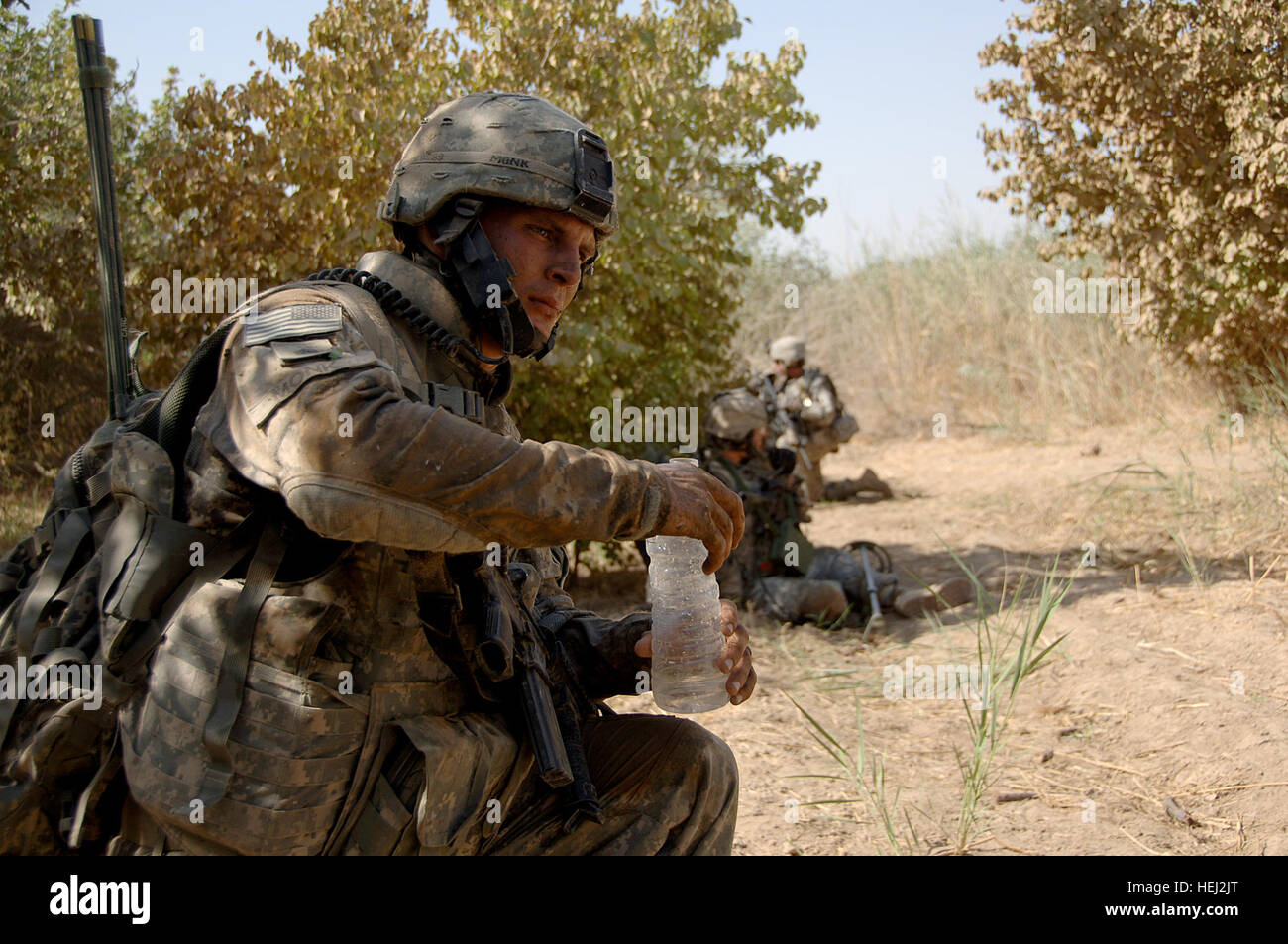 U S Army Sgt Michael Monk Assigned To Alpha Company 1st Battalion 5th Cavalry Regiment 2nd Brigade 1st Cavalry Division Takes A Knee For A Drink Of Cold Water On Eyebrow Island Near