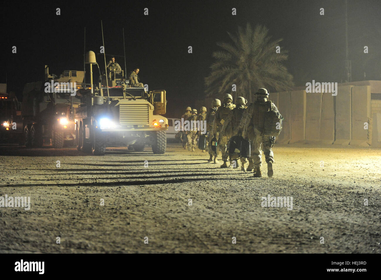 Marines assigned to Regimental Combat Team - 6, Multi National Force - West, commanded by Marine Col. Matthew A. Lopez, load up the vehicles as they prepare to redeploy after a successful year at Camp Ramadi, Iraq, Sept. 17. Regimental Combat Team - 6 Prepares to Redeploy 208400 Stock Photo