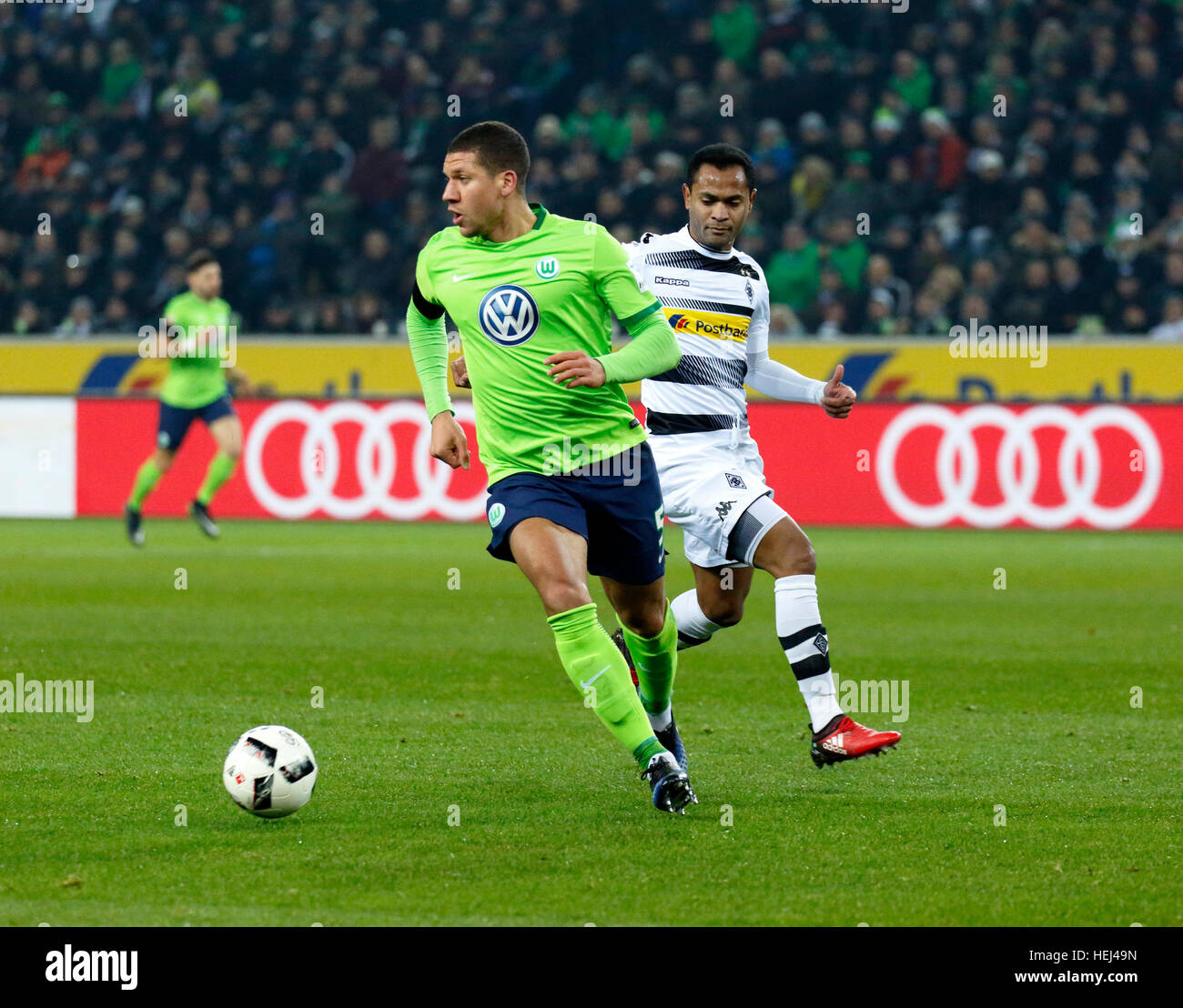 sports, football, Bundesliga, 2016/2017, Borussia Moenchengladbach vs VfL Wolfsburg 1:2, Stadium Borussia Park, scene of the match, Jeffrey Bruma van Homoet (Wolfsburg) and Raffael (MG) Stock Photo