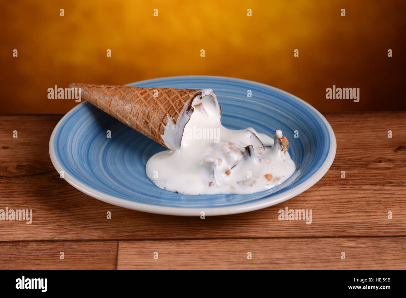 melted ice cream on the plate Stock Photo Alamy