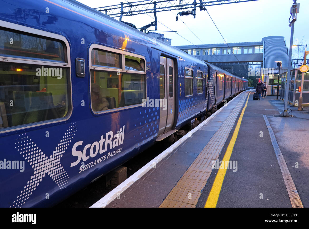 Scotrail Abellio train carriages in Motherwell station at dusk. Stock Photo