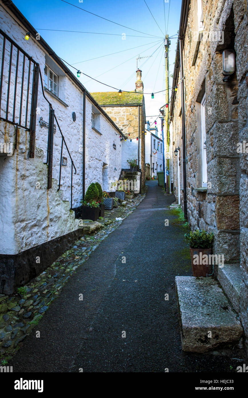 Quaint cottages in the picturesque Duck Street in Mousehole, Cornwall, England, UK. Stock Photo