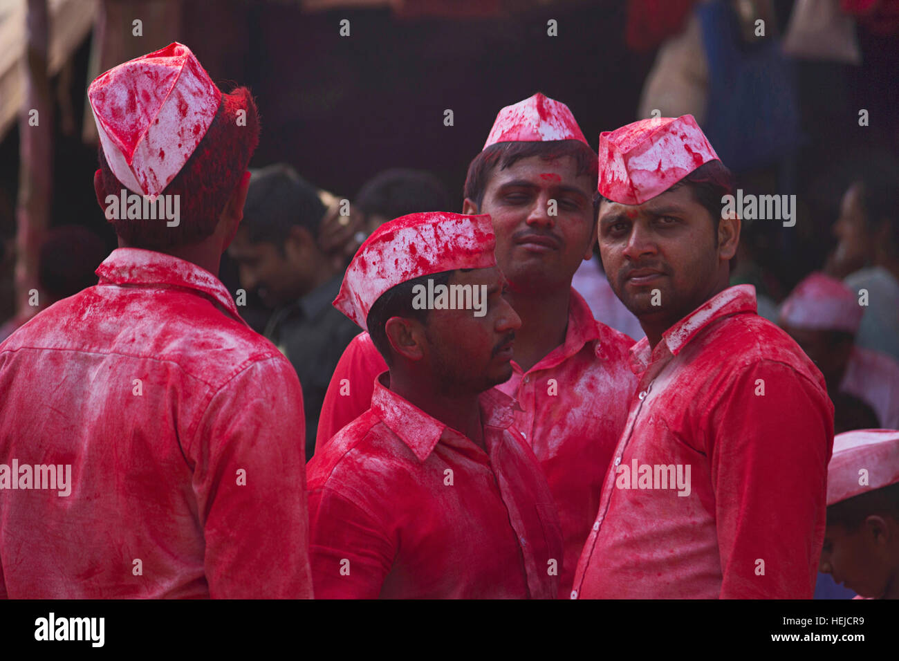 Men covered with red powder, Shreenath Mahaskoba yatra, Veer Purandhar, Pune, India Stock Photo