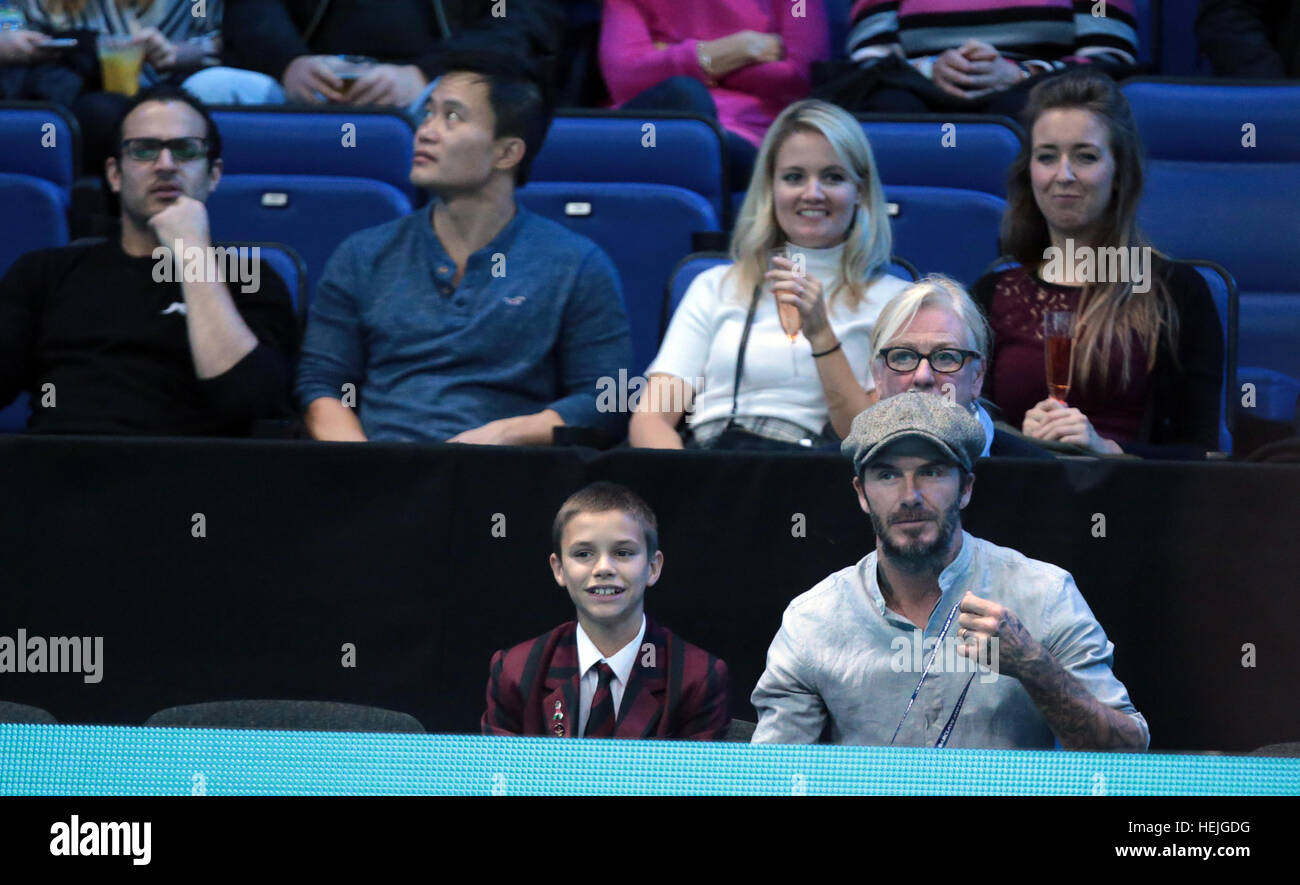 David Beckham and son Romeo watch the men's singles match between Milos Raonic of Canada and Dominic Thiem of Austria on day five of the ATP World Tour Finals at O2 Arena in London.  Featuring: David Beckham, Romeo Beckham Where: London, United Kingdom Wh Stock Photo