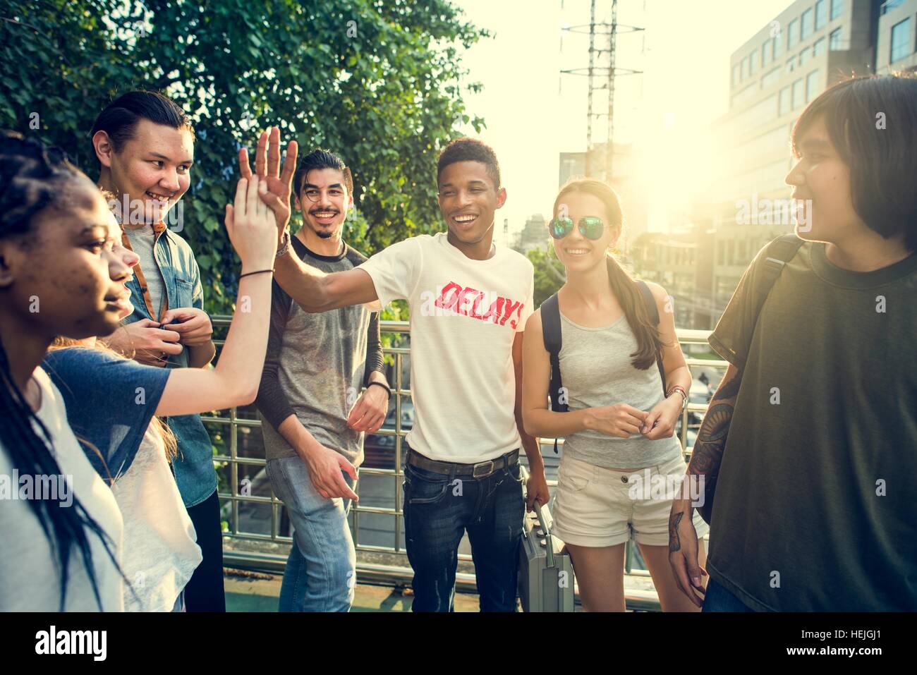 Diverse Group People High Five Concept Stock Photo - Alamy
