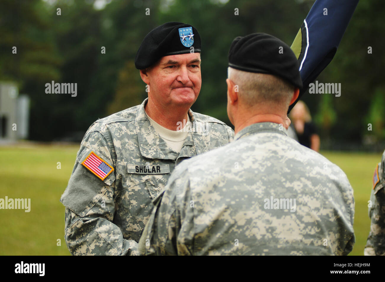 U.S. Army personnel conduct a change of command ceremony as leadership ...