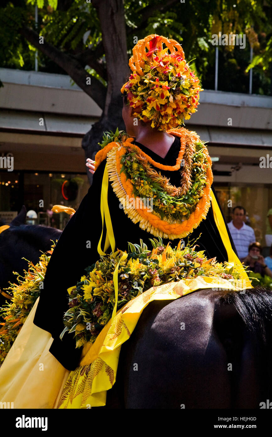 Pau horseback riders, like this one — magnificently adorned with a floral headdress and lei — will follow a procession of floats down Kalakaua Avenue during this year's Aloha Festivals Floral Parade. US Army 51979 Aloha spirit on display at floral parade Stock Photo