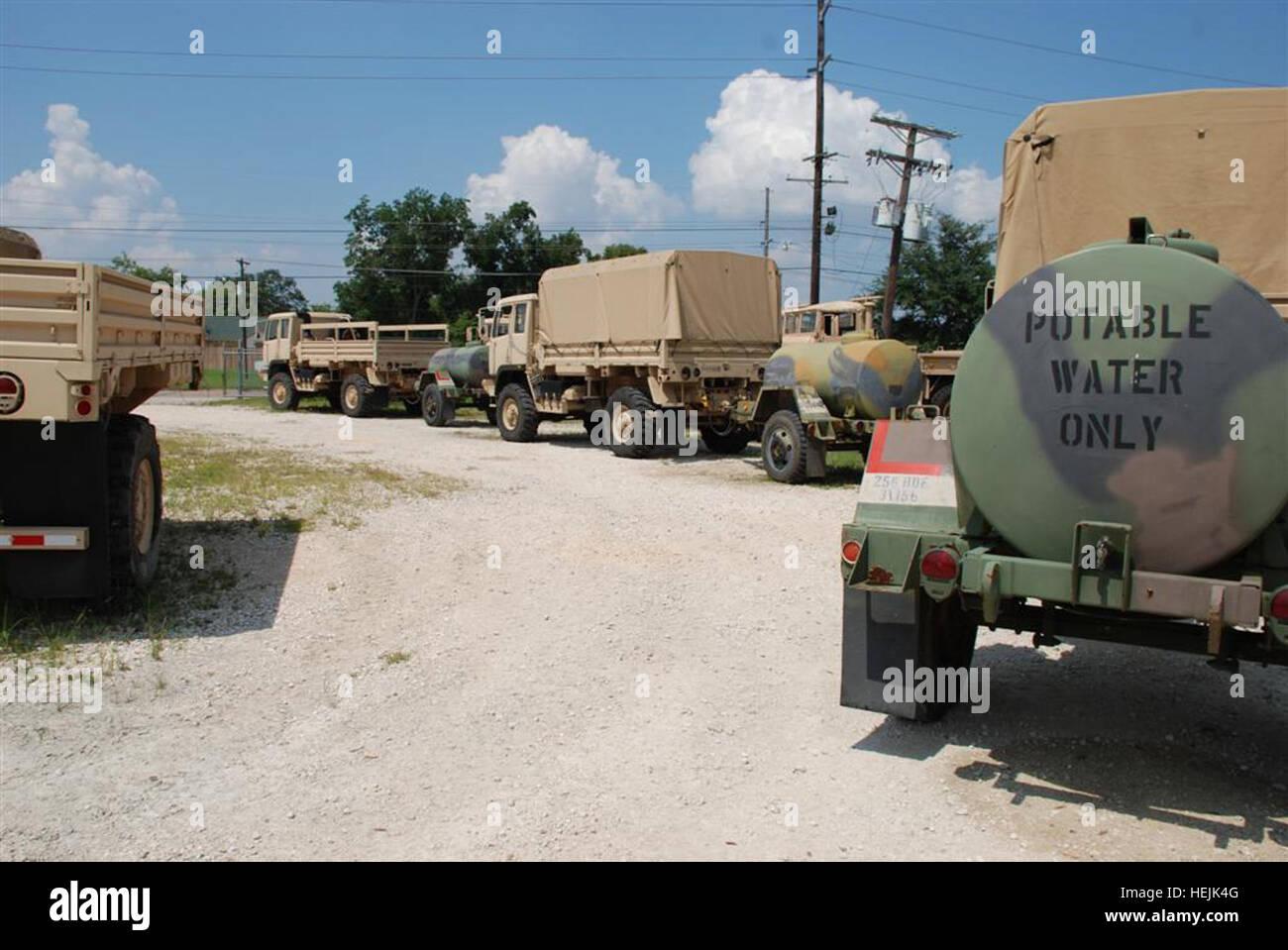 Military vehicles are staged and ready to bring clean water in the event that water becomes scarce. The Soldiers of 3rd Battalion, 156th Infantry Regiment are preparing to conduct operations in the event that Hurricane Gustav makes landfall on the Louisiana coast. Louisiana National Guard Gears Up Across the State 111692 Stock Photo