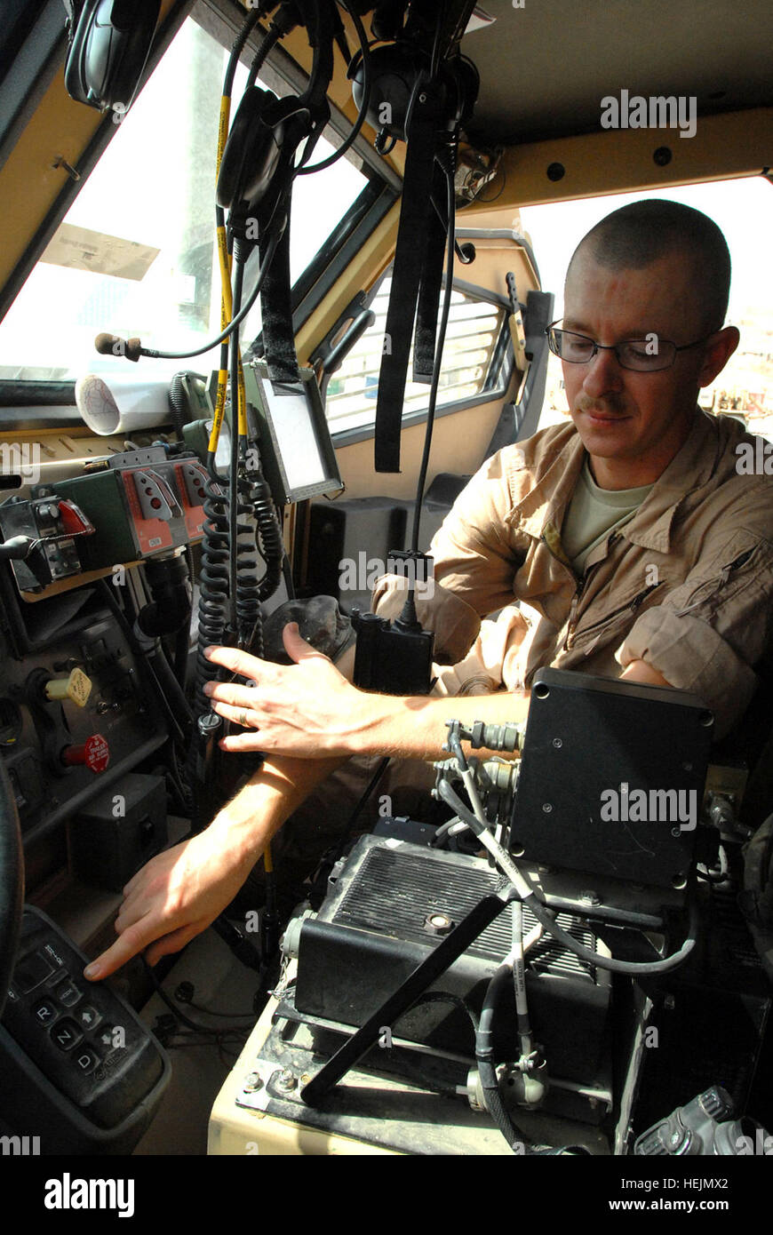 A U.S. Army motor pool maintenance squad leader demonstrated the ...