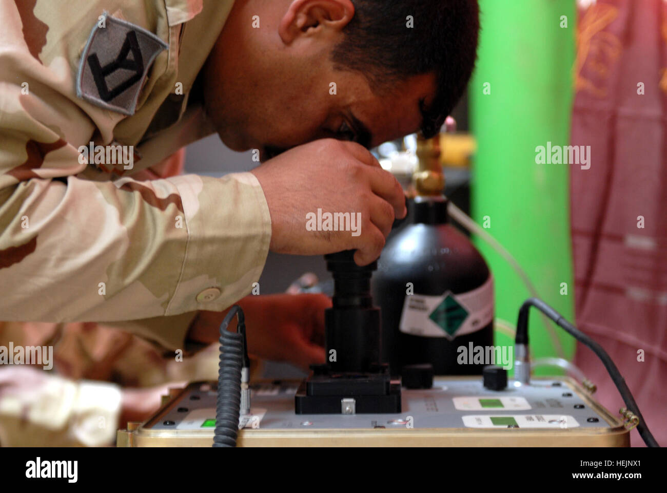 An Iraqi special operation forces soldier conducts maintenance on a set of night vision goggles at the 3rd Support Battalion's newly-formed night vision equipment repair shop located on a military compound in Baghdad, May 19. This is the first ISOF repair shop in the country that specializes in night vision equipment maintenance. New night vision maintenance shop allows 'Iraqi Special Operations Forces to own the night' 176997 Stock Photo