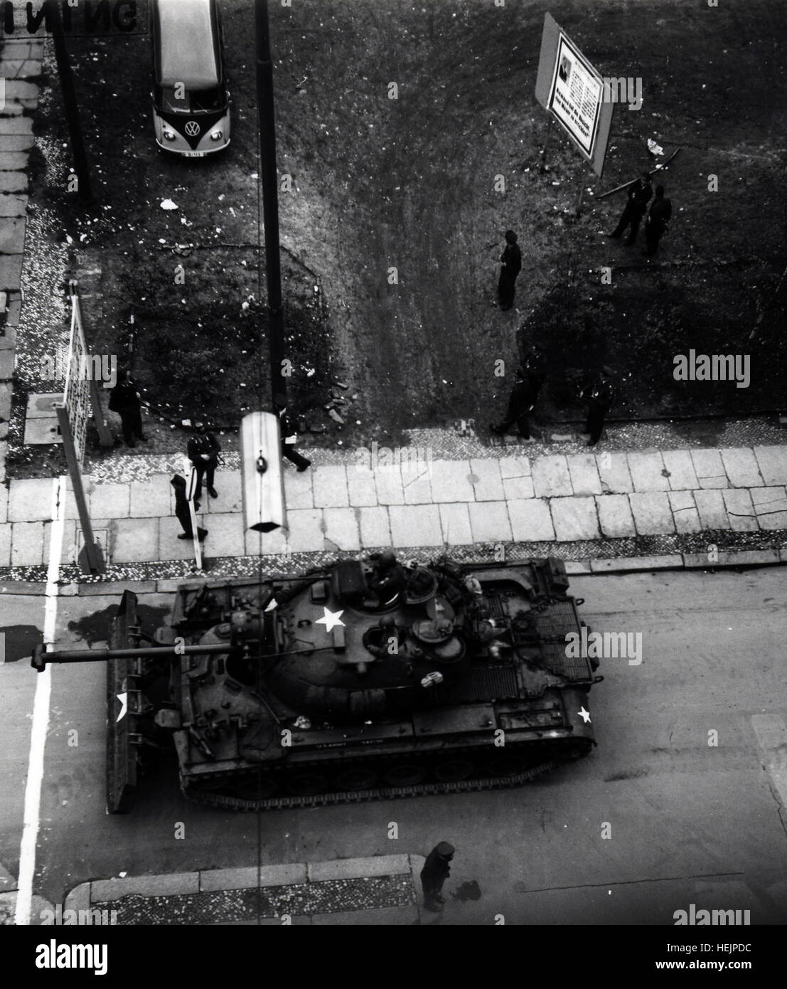 A U.S. tank crew stands guard at Checkpoint Charlie in West Berlin in