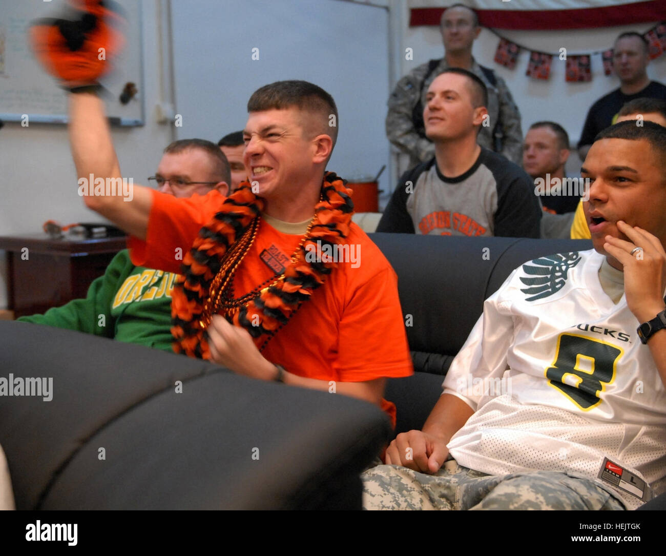 Sgt. Phillip Smith of Salem, shows support and spirit for his team, the Oregon State Univeristy Beavers in Tallil, Iraq, Dec. 4. The Civil War, as it is known, was made avalilable to Soldiers via ESPN through American Forces Network.The get together was made possible by Soldiers. The game was shown at Victory Base Complex, central Iraq and at Tallil, southern Iraq. Oregon Civil War in Iraq 228782 Stock Photo