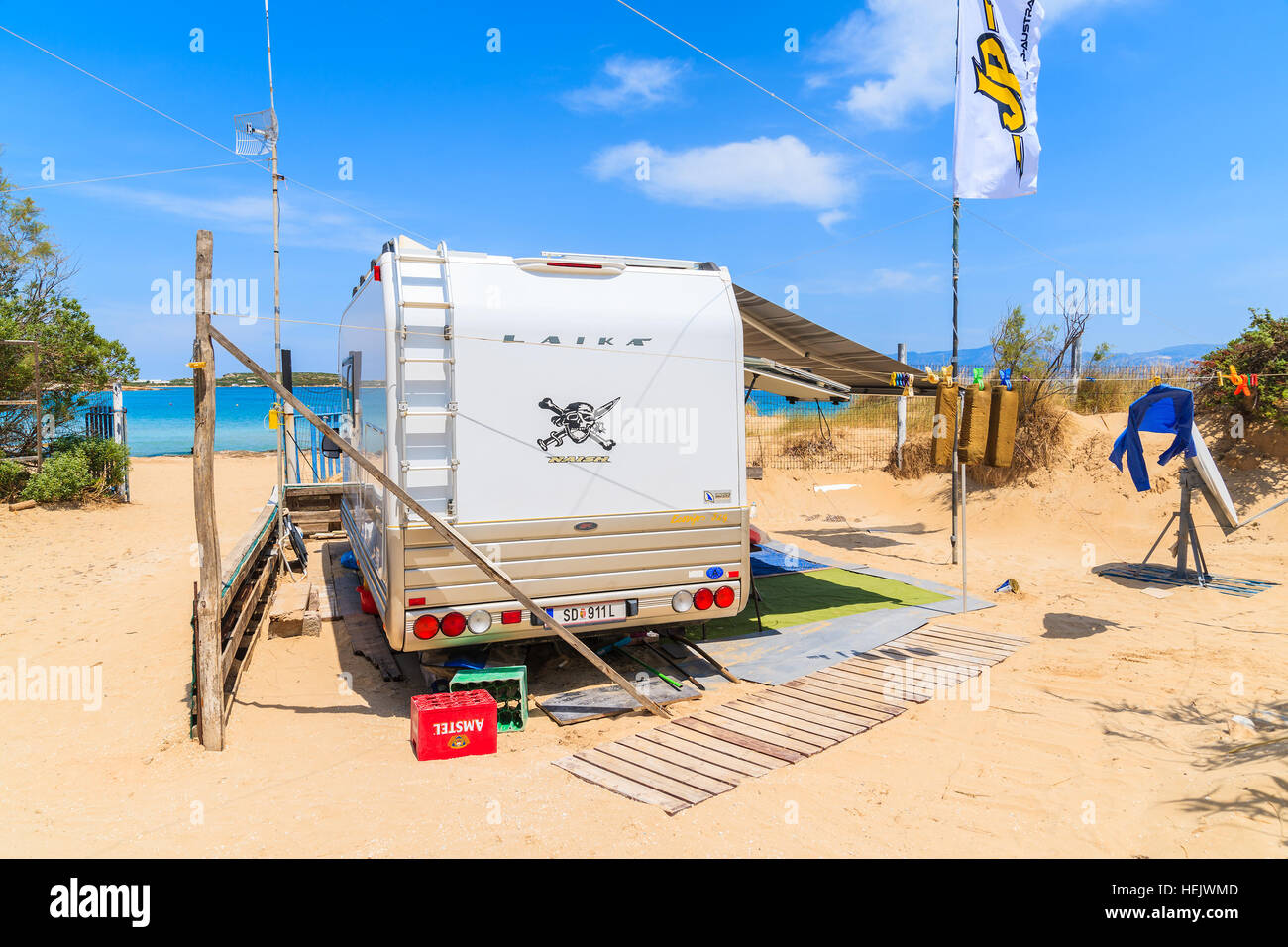 PAROS ISLAND, GREECE MAY 20, 2016 camper van parking on sandy beach