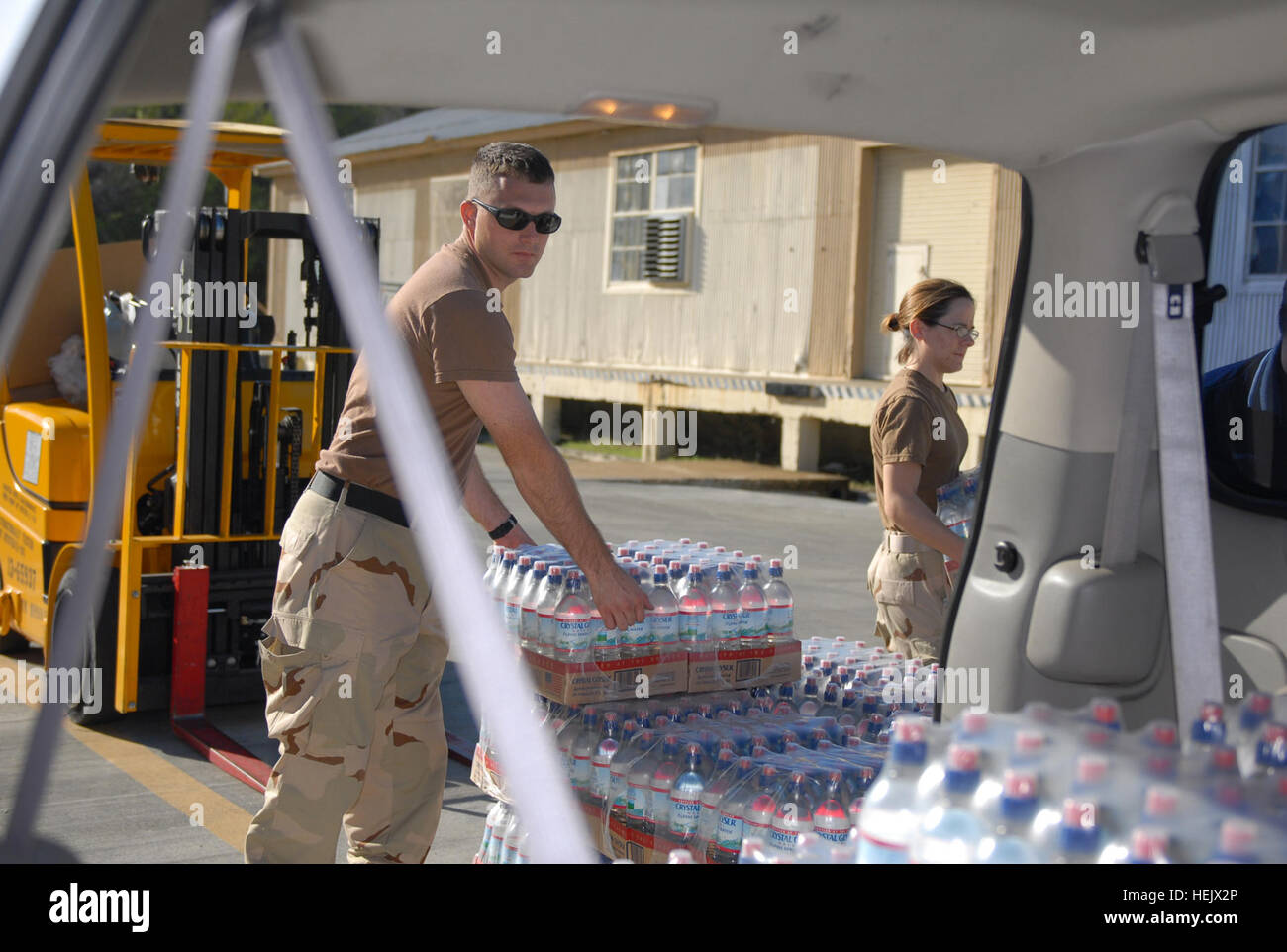 Navy Petty Officers deployed to Joint Task Force Guantanamo transport ...