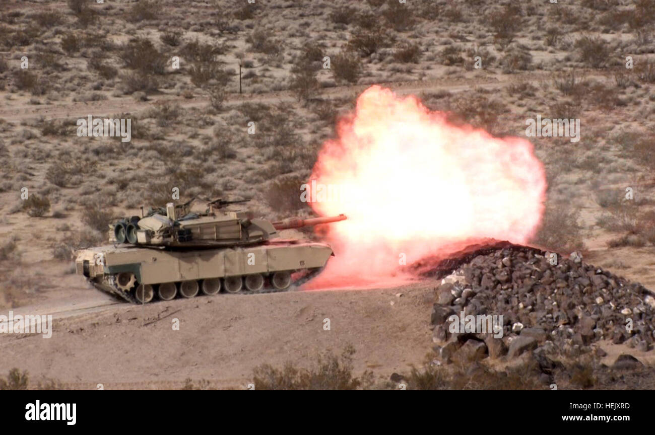 An M1A1 tank from C Troop, 1st Squadron, 11th Armored Cavalry Regiment, fires at a target at the Range 1 facility, Jan. 7. Cold Steel Welcomes New Year With a Bang 240508 Stock Photo