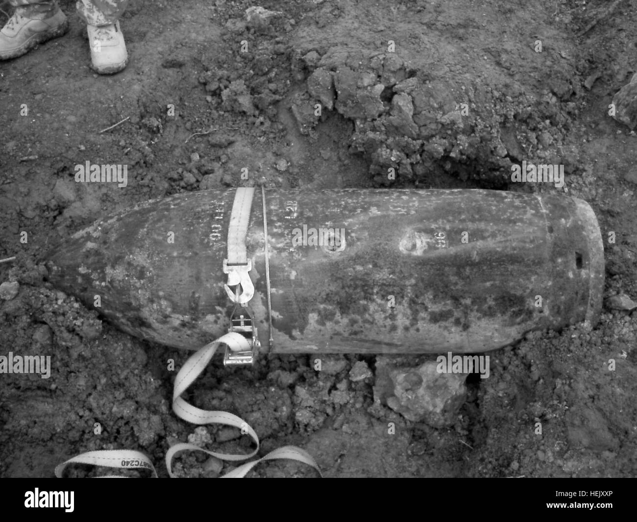 A British Mk13 1,000 pound bomb was discovered by construction workers excavating the land behind a small industrial facility near Mt. Goles, Kosovo. The site was home to Yugoslavian ammunition bunkers during the Kosovo conflict. It is most likely that the unexploded bomb was purposely dropped during the 1999 NATO bombing campaign, according to Cpt. Frank Pangelinan, commander of the 217th Explosive Ordnance Company, deployed to Kosovo as part of Multinational Battle Group- East. The California National Guard Unit arrived in Kosovo in September 2012. Since then, they have responded to 94 incid Stock Photo