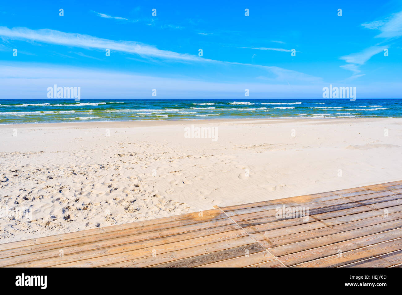 Wooden deck on sandy beach in Bialogora, Baltic Sea, Poland Stock Photo