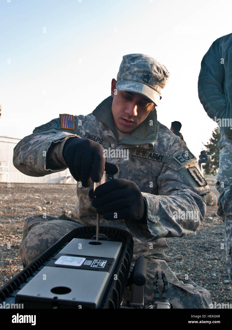 Staff Sgt. Christopher Phelps an explosive ordnance disposal team leader prospect, assigned to 49th Ordnance Battalion at Fort Campbell, Ky., works on a Packbot 510 during the EOD Team Leader Training Academy at Joint Base Lewis-McChord, Wash., Dec. 6. The 3rd Ordnance Battalion hosted the 20th Support Command Team Leader Training Academy in order to provide prospective EOD team leaders and team members with realistic scenario-based leader training in a controlled environment. Soldiers train to become EOD leaders 496349 Stock Photo