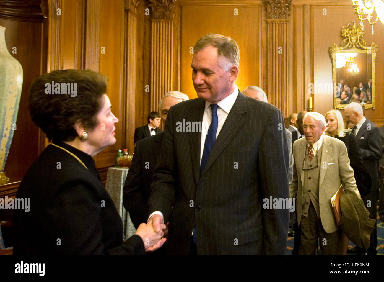 Deputy Defense Secretary William J. Lynn, III, shakes hands with Joyce Murtha, widow of U.S. Congressman John Murtha (D-Pa.), following a memorial service for Murtha at the U.S. Capitol in Washington D.C., March 3, 2010.  Murtha was an officer in the Marine Reserves in 1974 when he became the first Vietnam War combat veteran elected to Congress. He later became the Chairman of the House Appropriations Subcommittee on Defense and an advocate for veterans affairs on Capitol Hill.  Army photo by D. Myles Cullen (released) Defense.gov photo essay 100303-A-0193C-012 Stock Photo