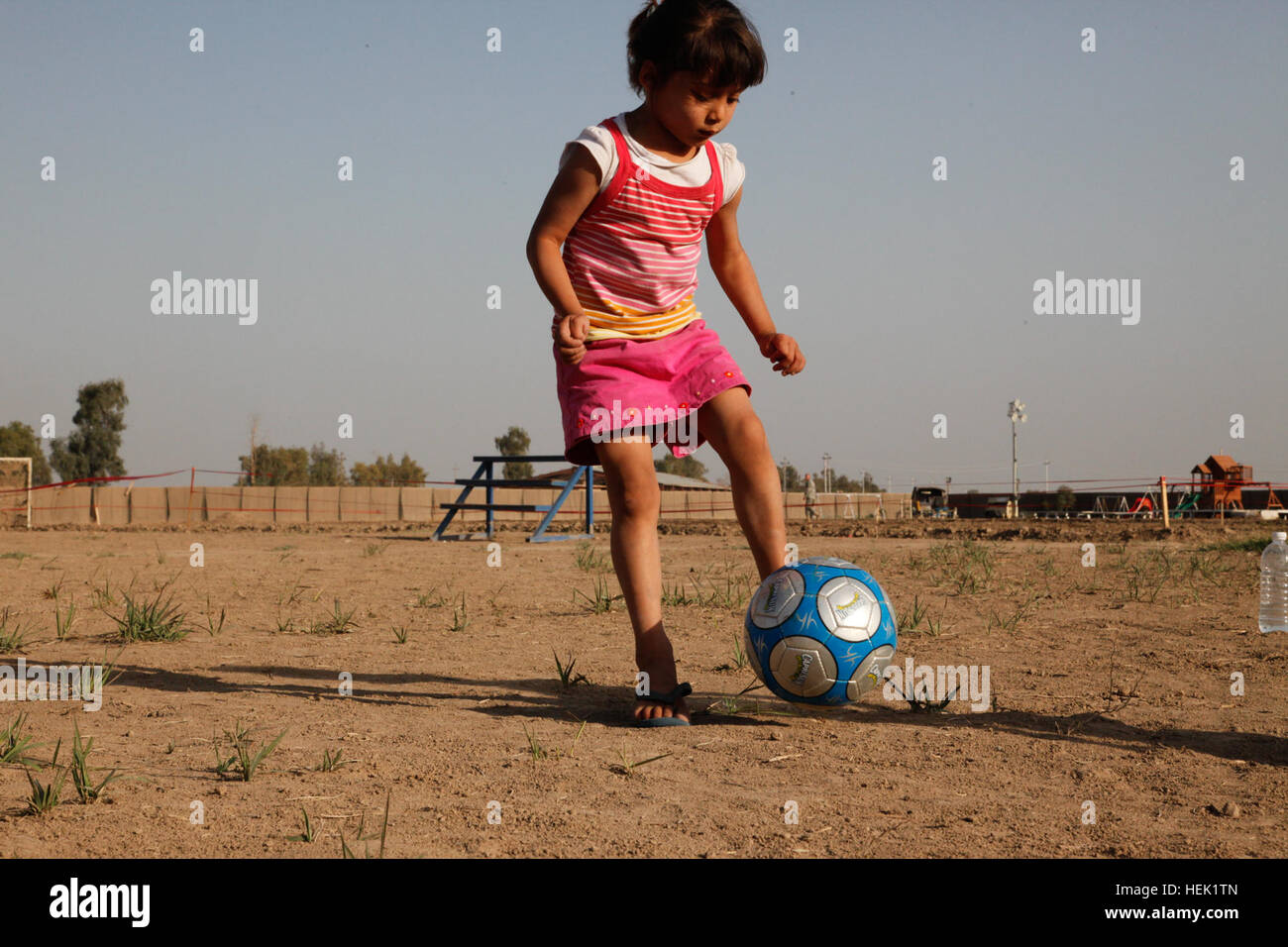 A young girl kicks a soccer ball during the twoday, semiannual
