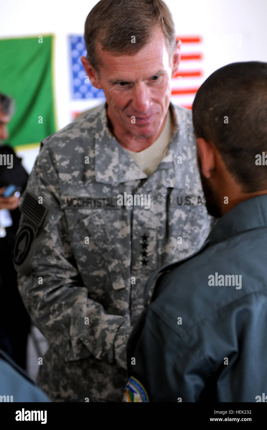 International Security Assistance Force commander, Gen. Stanley A. McChrystal, shakes the hand of an Afghan national police recruit at Forward Operating Base Shank, April 9. McChrystal was at FOB Shank to visit with the Logar Provincial Reconstruction Team from the Czech Republic that also helps train the ANP in addition to helping with projects in the province. ISAF commander patrols with Czech PRT 268865 Stock Photo