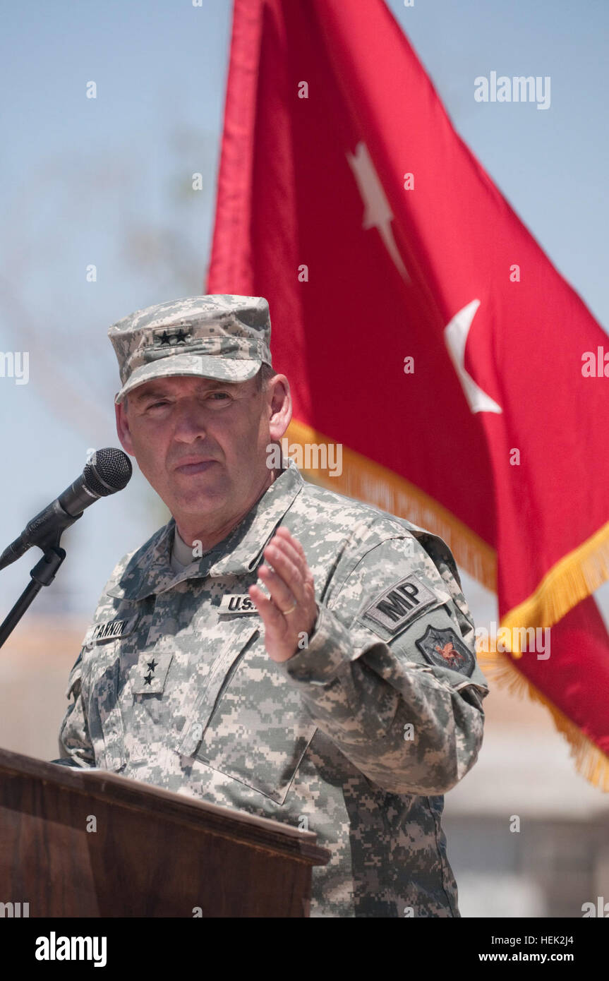 Maj. Gen. Nelson Cannon, the United States forces - Iraq deputy commanding general for detainee opertions, speaks at the 89th Military Police Brigade Transfer of Authority Ceremony at Camp Cropper, Iraq, April 24. The 89th MP Bde. wrapped up a their year in Iraq by transfering authority to the 49th MP Tactical Command Post and the 705th Military Police battalion. The 89th was responsible for overseeing the closure of Camp Bucca in Sept. 2009 and the transfer of the Taji detentiion facility to the Government of Iraq in March 2010. 89th MP Brigade finishes historic tour 273834 Stock Photo