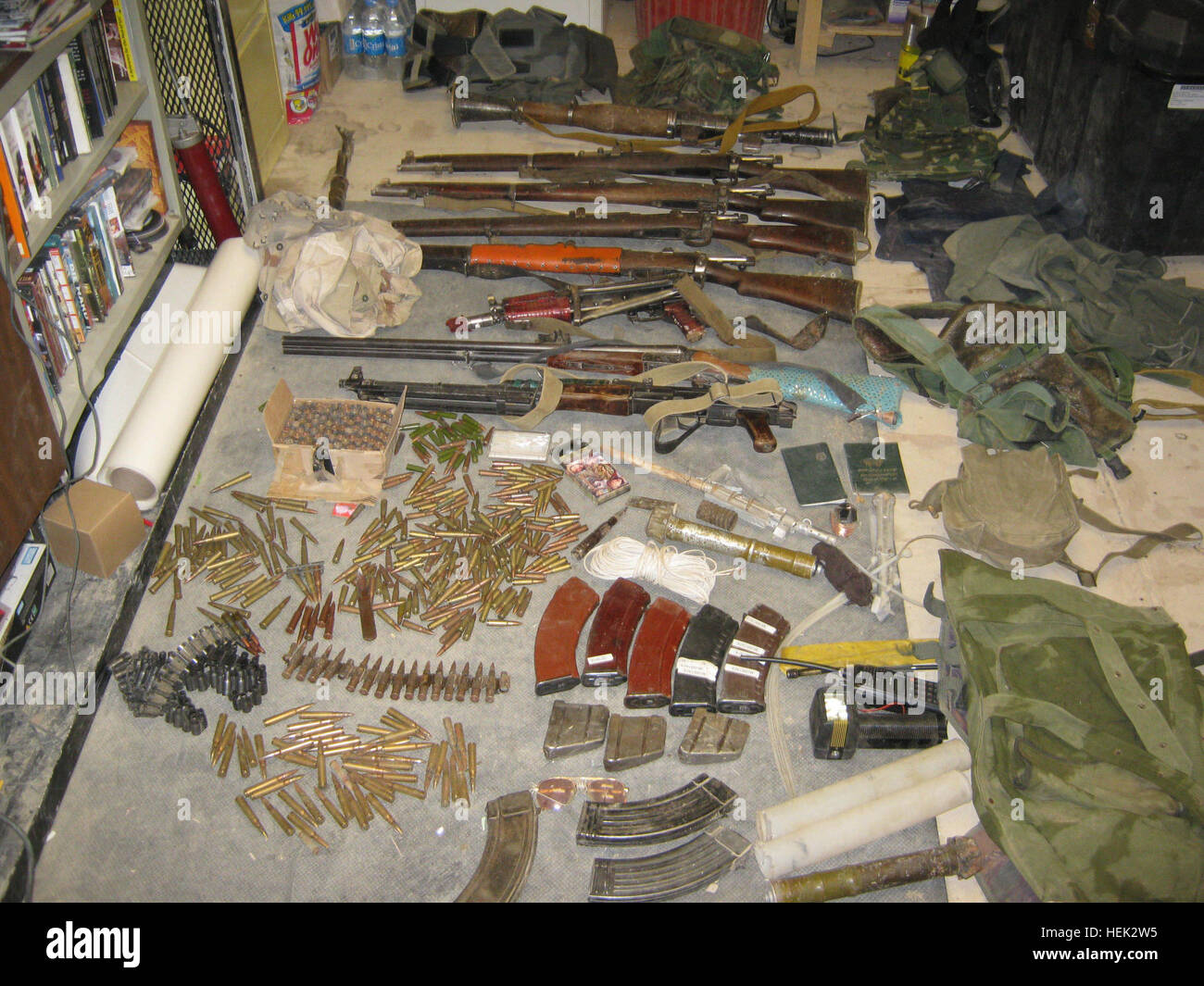 A sizeable weapons cache was discovered in Kuz Jangjay, Sayed Abad district, Wardak province, Afghanistan, April 26, following a report of a cache near the Kuz Jangjay village. Afghan National Security Forces regularly join International Security Forces for combined operations in the Sayed Abad District. The informant who led the combined force to the cache depicted received 210,000 Afghani through the Department of Defense Small Rewards Program. These and other types of munitions are used by the Taliban and insurgents to target innocent Afghan civilians and members of the International Securi Stock Photo