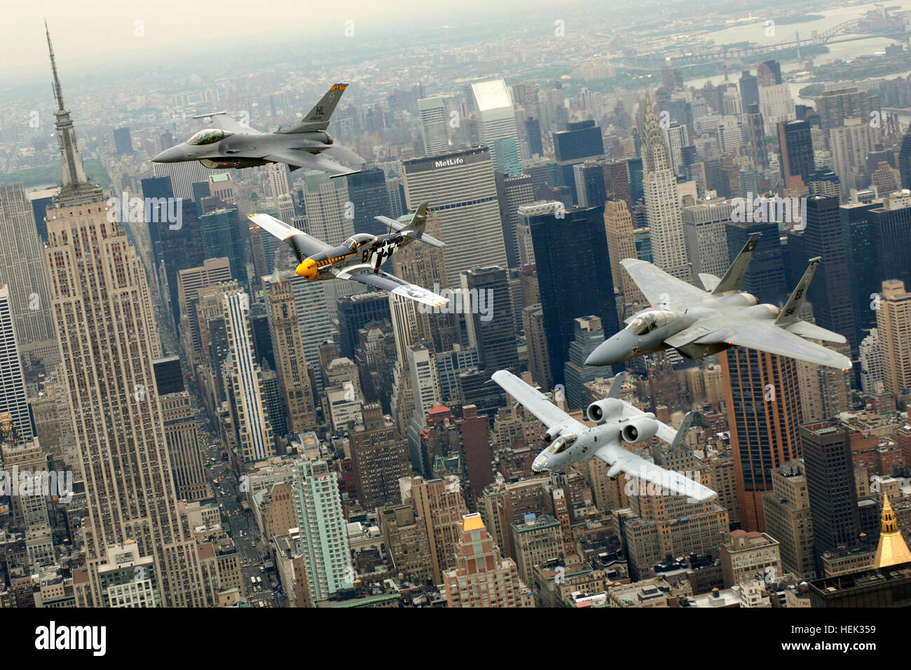 A P-51 Mustang, flown by Jim Beasley; an F-16 Fighting Falcon, flown by Maj. Dax Cornelius from Hill Air Force Base, Utah; an F-15 Eagle, flown by Capt. Tony Bierenkoven from Eglin AFB, Fla.; and an A-10 Thunderbolt II, flown by Capt. Jeff Yost of Pope AFB, N.C., fly over New York City on Thursday, May 25, 2006. The 'Heritage Flight' pilots flew in the Jones Beach Air Show on Long Island. Heritage Flight formations are designed to show generations of fighter aircraft. (U.S. Air Force photo/Tech. Sgt. Ben Bloker) Classic aircraft over New York City 2008 Stock Photo