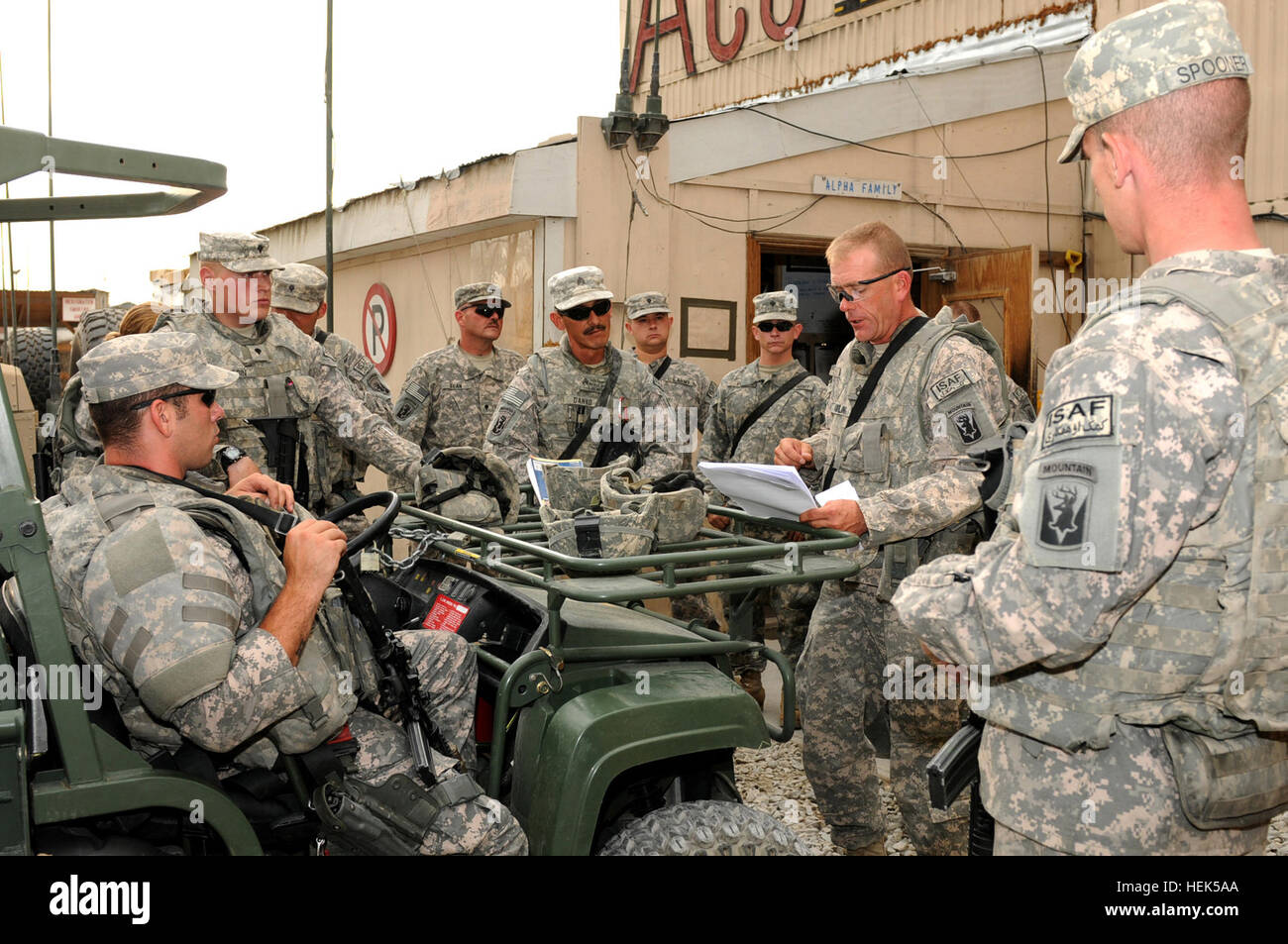 Staff Sgt. Peter Rawling, center, convoy commander for Alpha Company