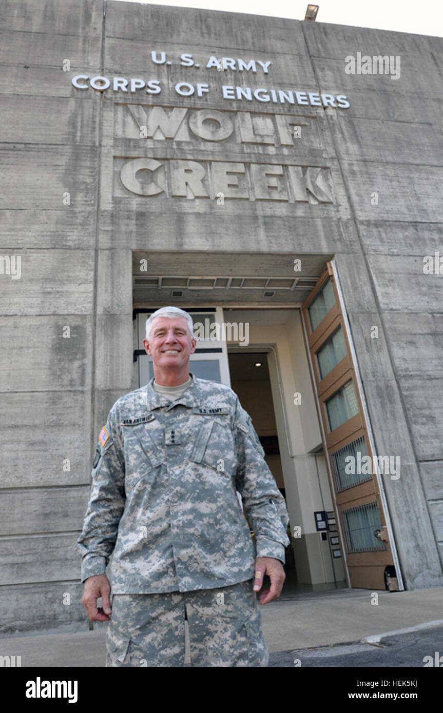 Lt. Gen. Robert Van Antwerp, the chief of engineers and commanding general of the U.S. Army Corps of Engineers, poses outside the powerhouse of the Wolf Creek Dam in Jamestown, Ky.  The Wolf Creek Dam is a multi-purpose dam on the Cumberland River in the western part of Russell, County, Kentucky.  The dam serves at once four purposes; it generates hydoelectricity; it regulates and limits flooding; it releases stored water to permit year-round navigation on the lower Cumberland River; and it creates Lake Cumberland for recreation, which has become a popular tourist attraction.  Because of seepa Stock Photo